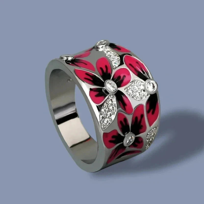 Anillo de Flores Rojas con Circonio