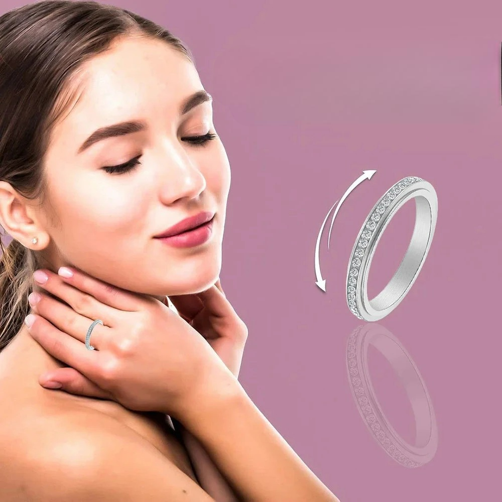 Anillo Giratorio Antiestrés con Circonia Plateada