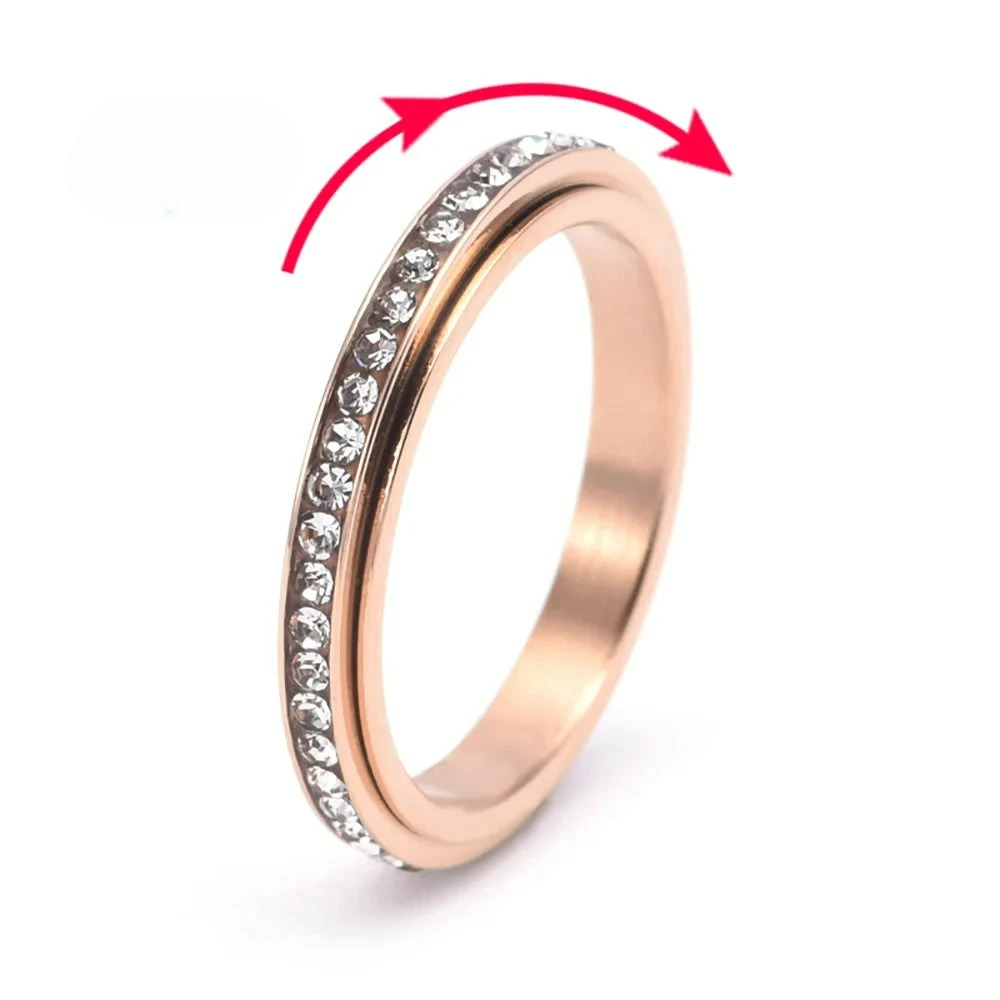 Anillo Giratorio Antiestrés con Circonia en Oro Rosa