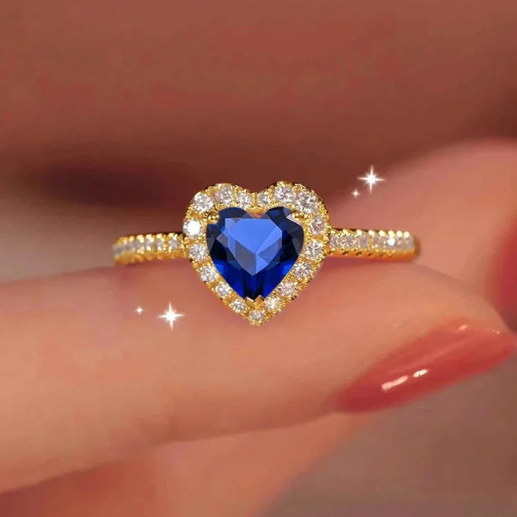 Anillo con Corazón y Circonia azul y oro