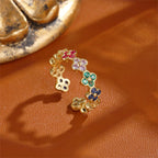 Anillo con tréboles de 4 hojas coloreados en circonio oro