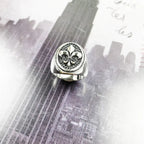 Anillo de sello Flor de Lis de plata