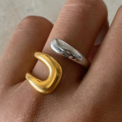 Anillo Dorado y Plateado con Gota de Agua Hueca