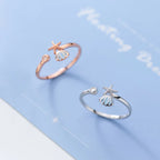 Anillo Conchas Estrella de Mar y Concha de Vieira con Circonio en oro rosa