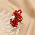 Anillo con forma de flor de coral y perlas