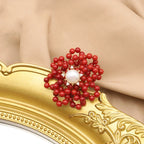 Anillo con forma de flor de coral y perlas