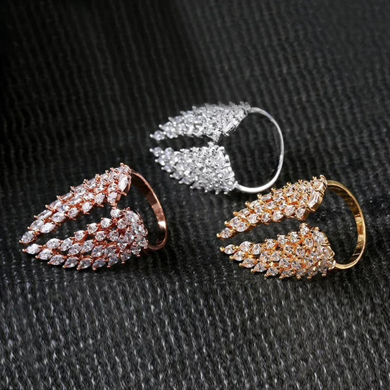 Anillo Pluma en Circonio dorado