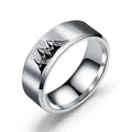 Anillos de colores con montañas de plata