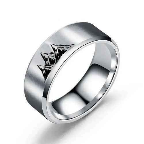 Anillos de colores con montañas de plata