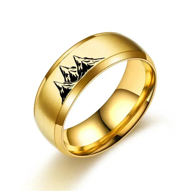 Anillos de colores con montañas de oro