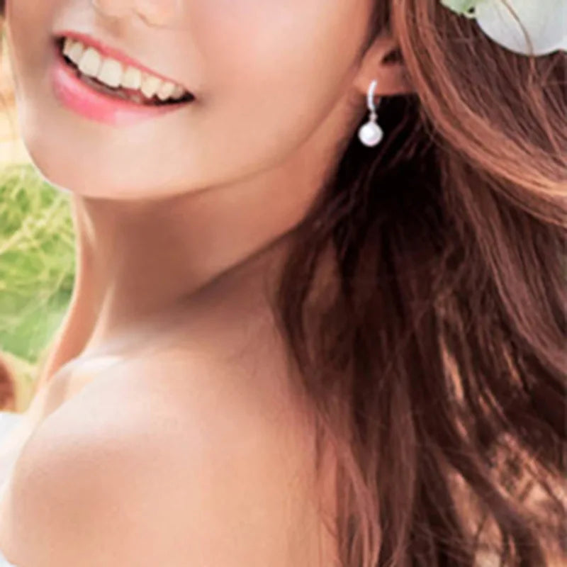 Aretes Clásicos con Perla y Circón