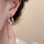 Aretes de botón con perla y piedras