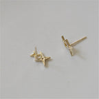 Aretes de Doble Estrella con Circonita en Oro
