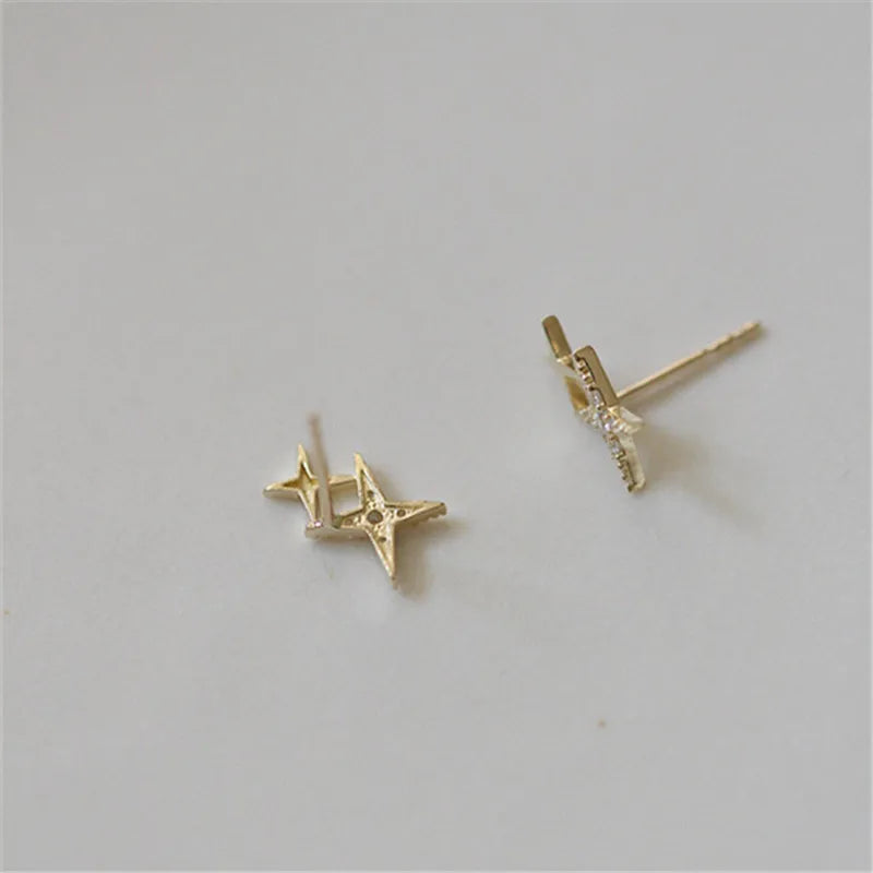 Aretes de Doble Estrella con Circonita en Oro