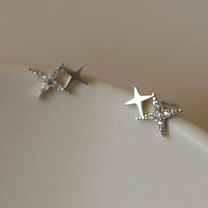 Aretes de Doble Estrella con Circonita en Plata