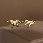 Aretes de botón en media luna Sol oro
