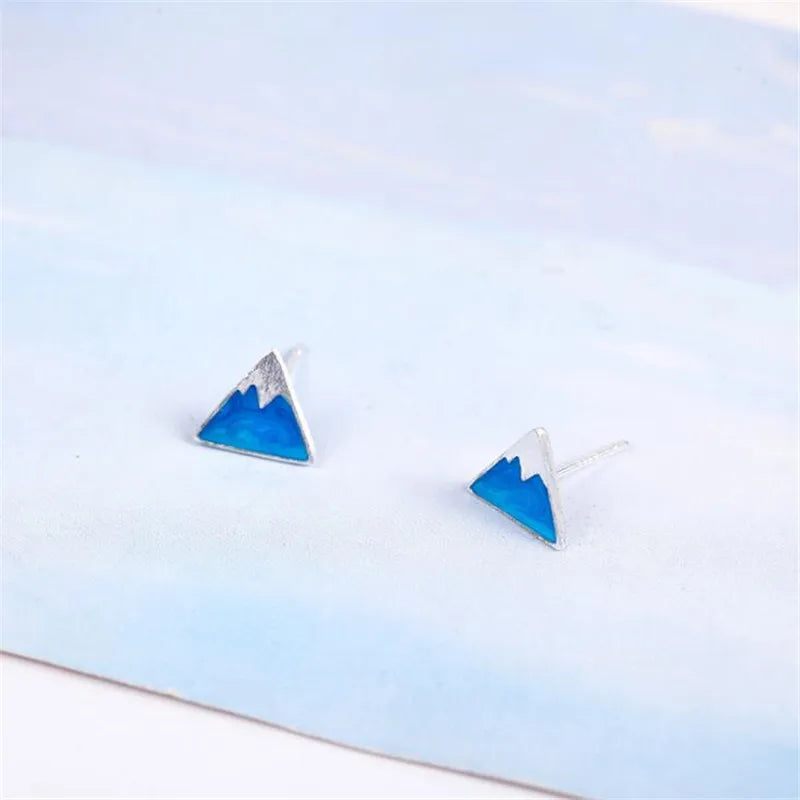 Aretes de Clavo en Triángulo Iceberg