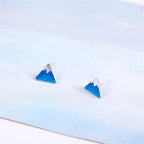 Aretes de Clavo en Triángulo Iceberg