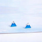 Aretes de Clavo en Triángulo Iceberg
