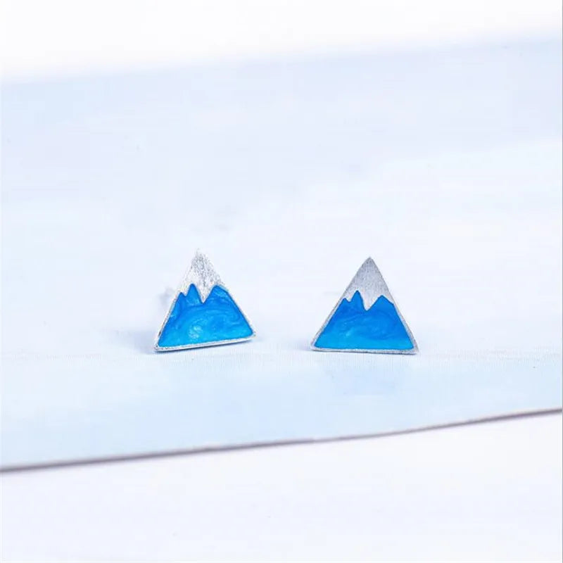 Aretes de Clavo en Triángulo Iceberg