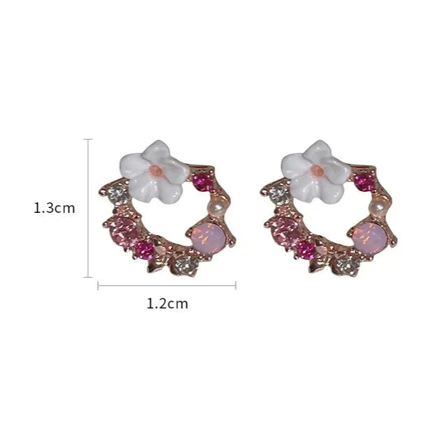 Aretes de botón con flores y perlas rosas