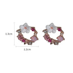 Aretes de botón con flores y perlas rosas
