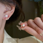 Aretes de botón con flores y perlas rosas 