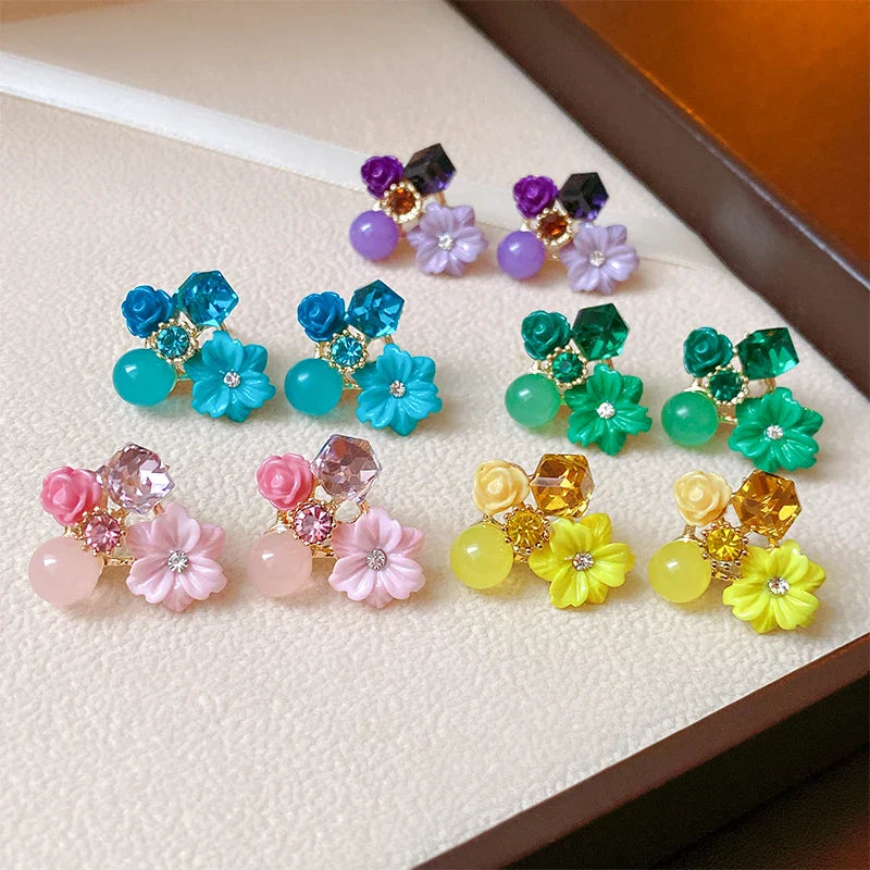 Aretes de botón con flores y perlas violetas 1