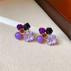 Aretes de botón con flores y perlas violetas 1