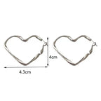 Aretes de Clavo Gran Corazón