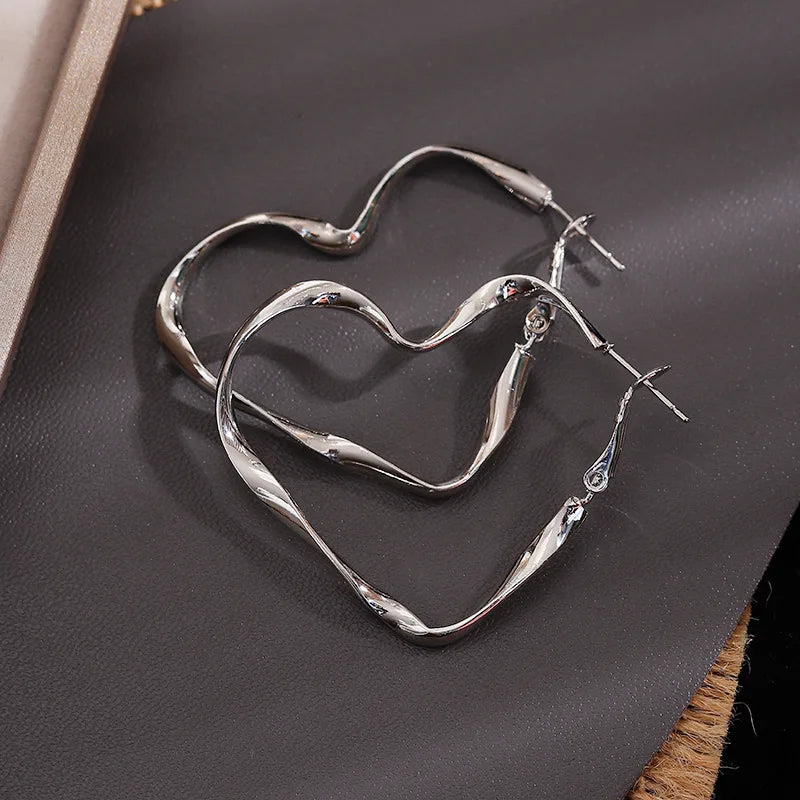 Aretes de Clavo Gran Corazón