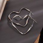 Aretes de Clavo Gran Corazón
