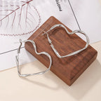 Aretes de Clavo Gran Corazón