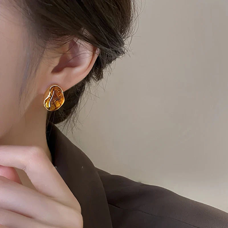 Aretes de botón Ojo de Tigre de Protección para Mujer