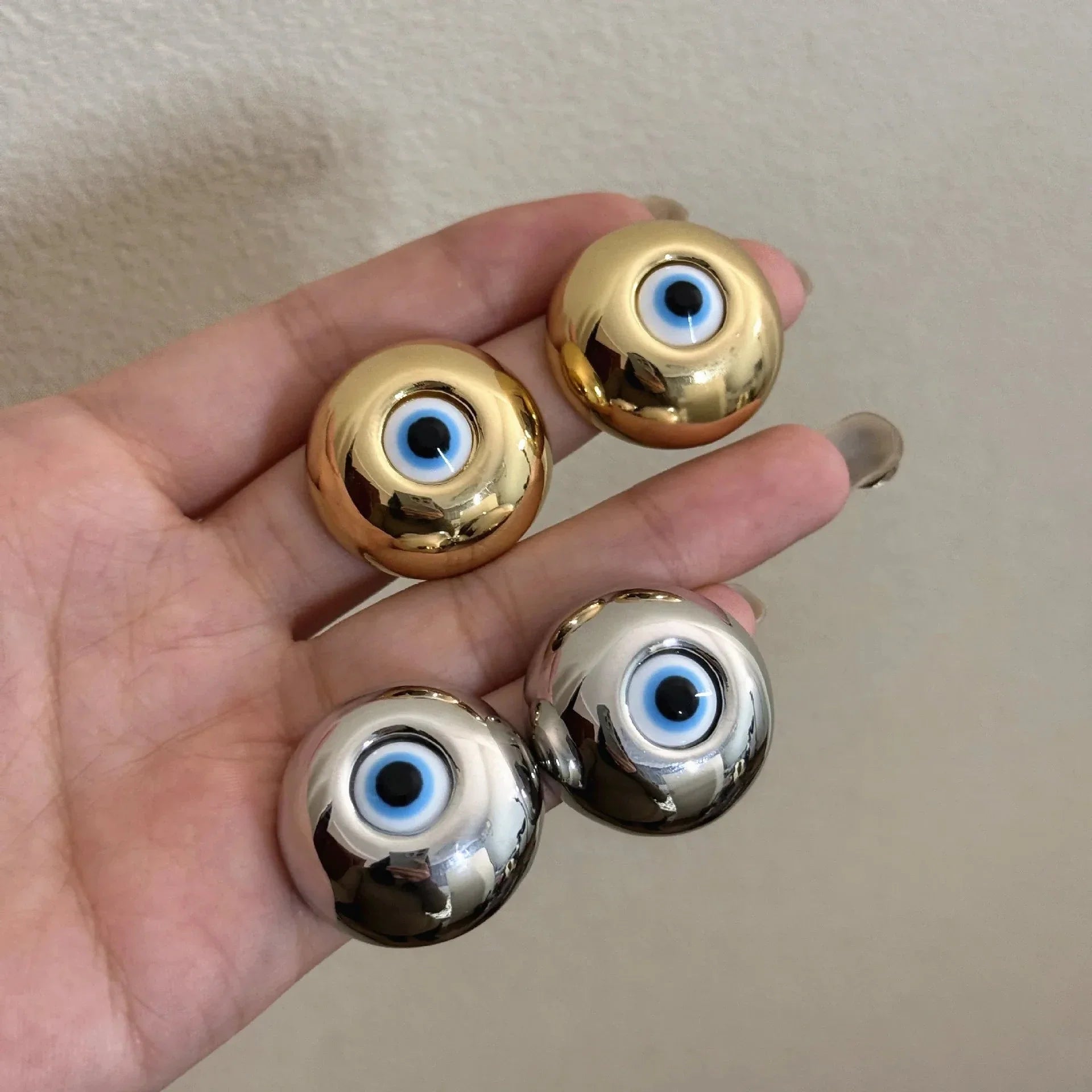 Aretes de botón vintage contra el mal de ojo en plata