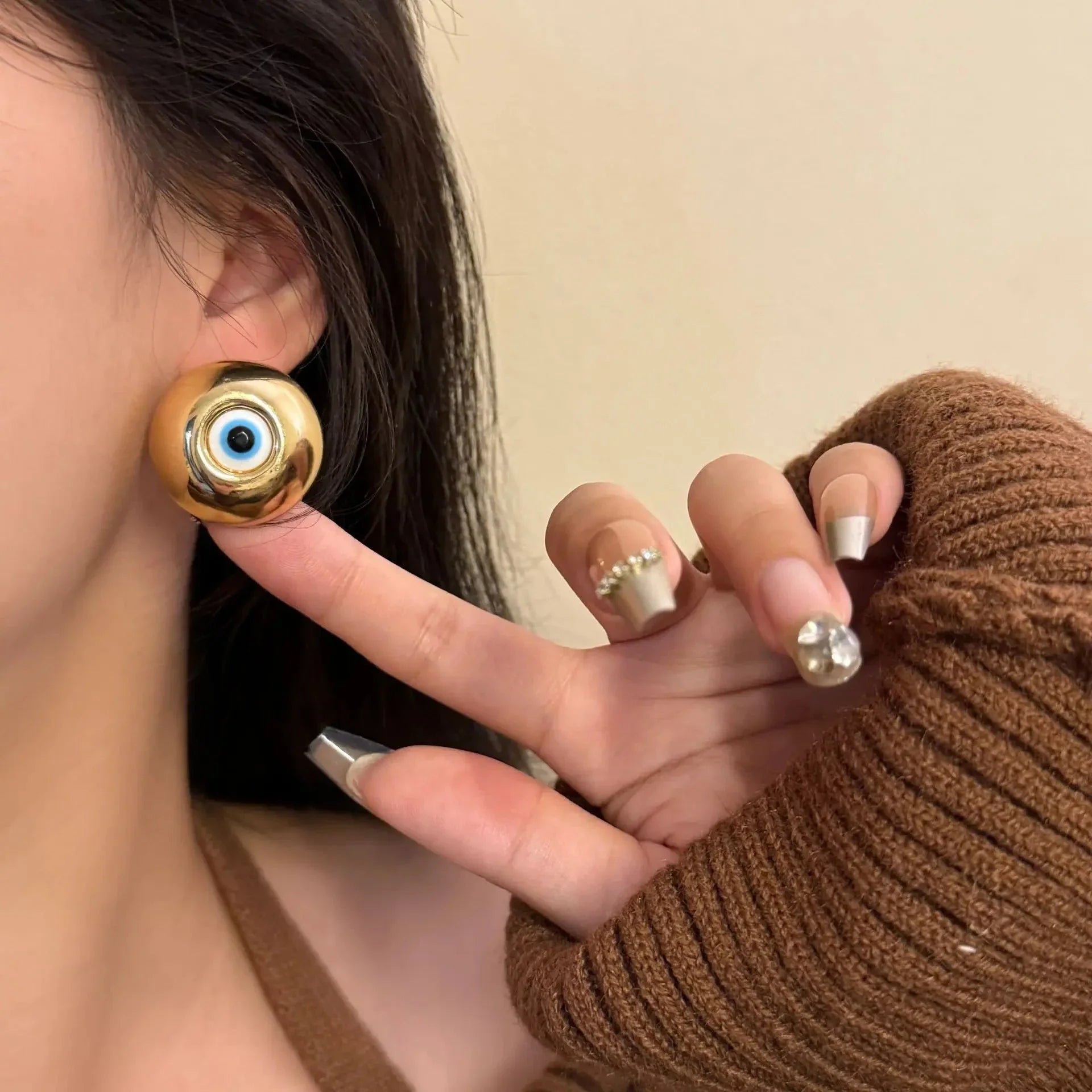 Aretes de botón vintage contra el mal de ojo en oro