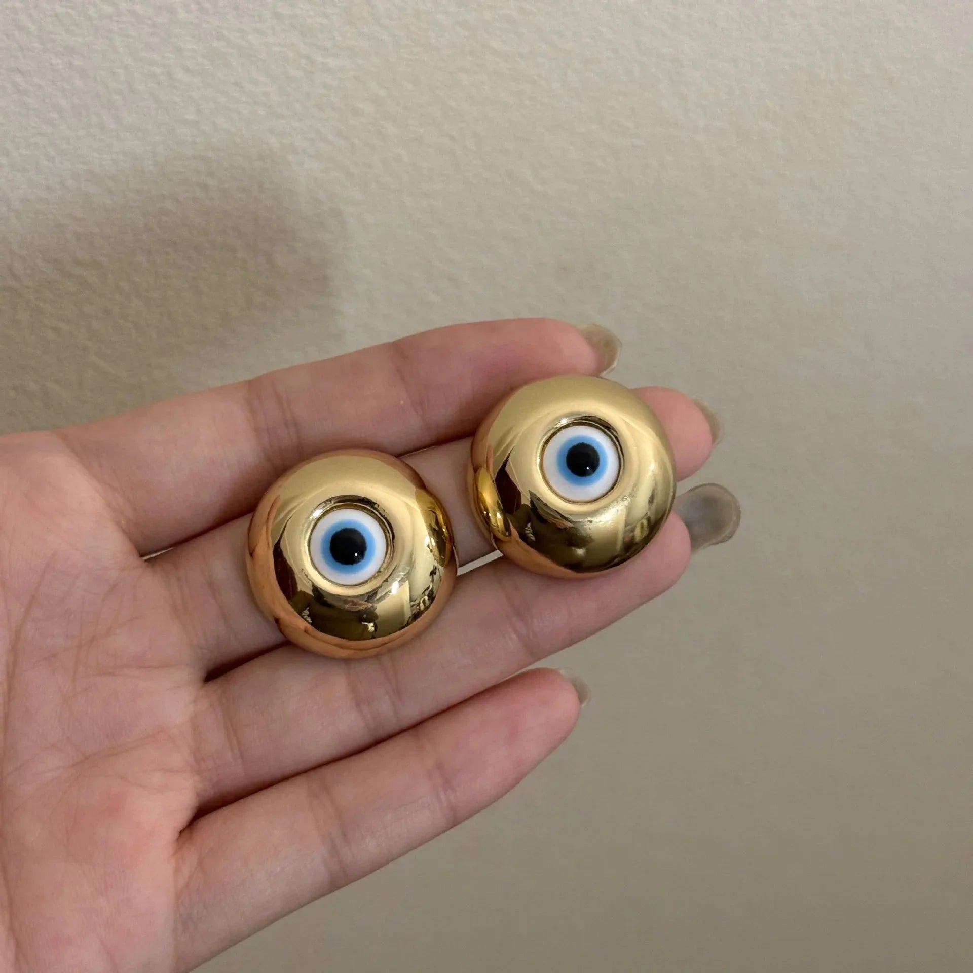 Aretes de botón vintage contra el mal de ojo en oro