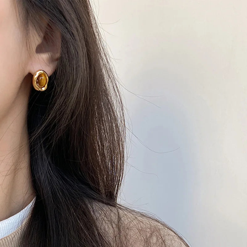 Aretes de Botón Ovalados Ojo de Tigre