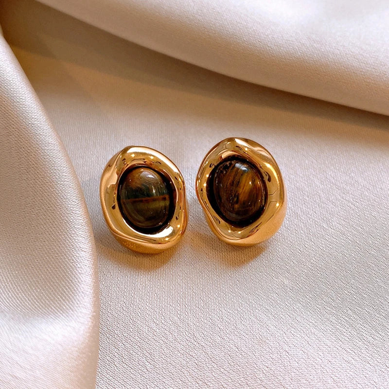 Aretes de Botón Ovalados Ojo de Tigre