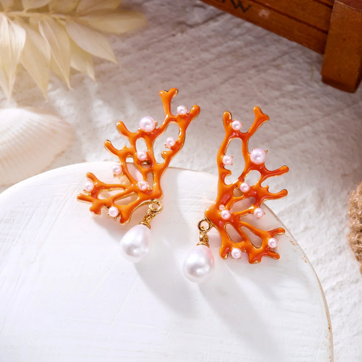 Aretes de coral naranja y perla