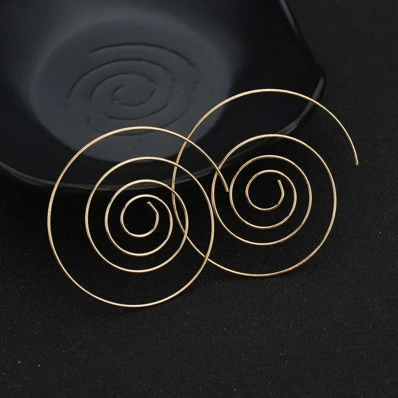 Aretes de Aro Espiral para Mujer en Oro