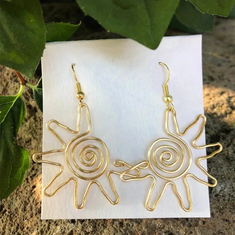 Aretes Colgantes Estilo Sol
