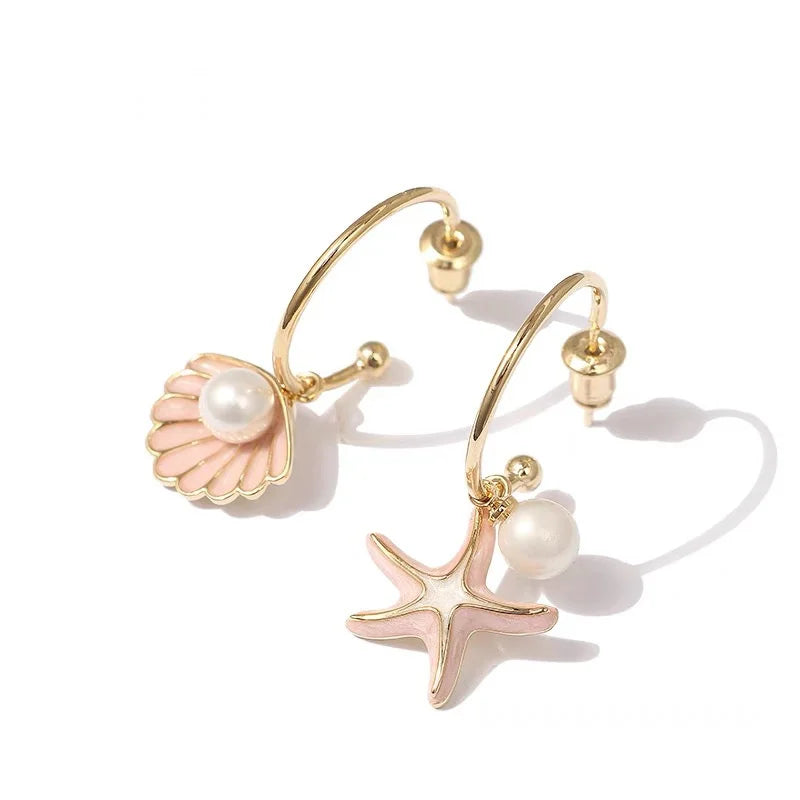 Aretes esmaltados con concha y perla rosa