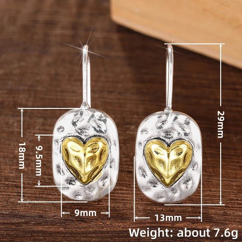 Pendientes de corazón en color plata y oro 
