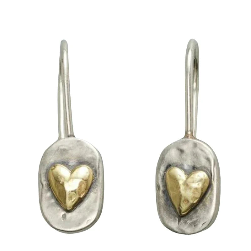 Pendientes de corazón en color plata y oro 