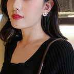 Aretes Flor Dorada para Mujer