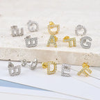 Aretes con inicial