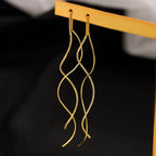 Aretes largos de plata o de oro