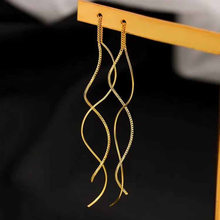 Aretes largos de plata o de oro