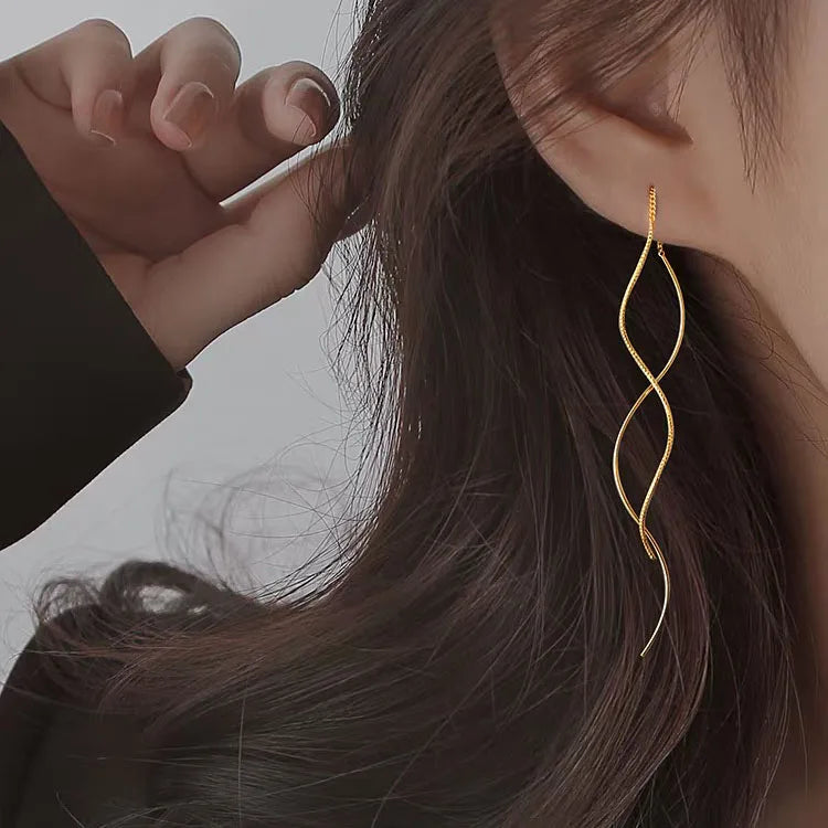 Aretes largos de plata o de oro